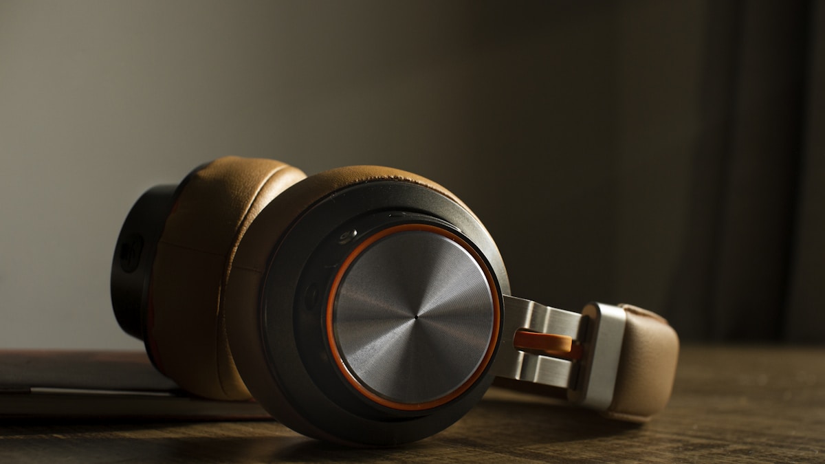 A garbage disposal unit under a kitchen sink, with pipes and electrical connections visible. Primary keyword: garbage disposal.